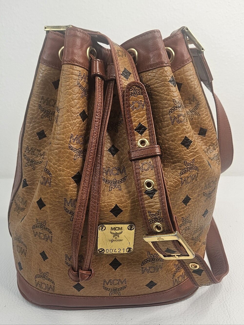 Authentic MCM Visetos Cognac Drawstring Bucket Crossbody Bag Leather Handmade